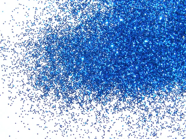 Paillettes bleu foncé scintillent sur fond blanc — Photo