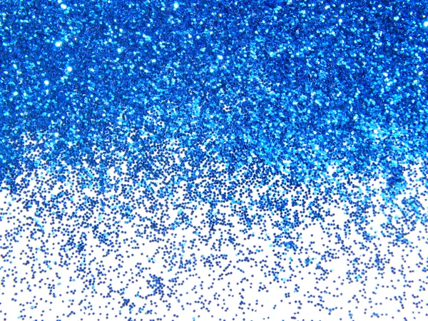 Donker blauwe glitter sparkle op witte achtergrond — Stockfoto