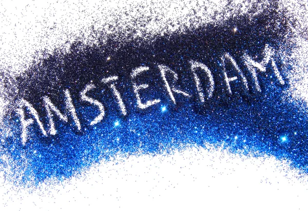 Inscription Amsterdam on black and blue glitter sparkles on white background