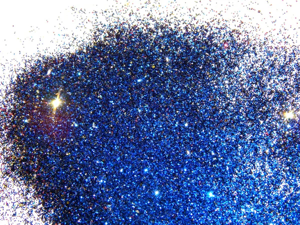 Blauw, zwart, gouden en rood glitter sparkle op witte achtergrond — Stockfoto