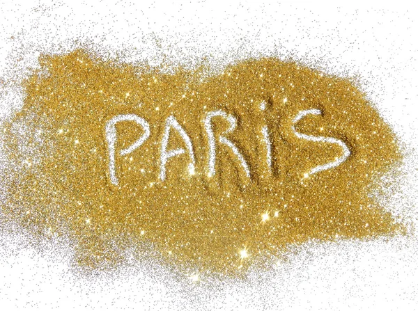 Inscripción París sobre brillo dorado brilla sobre fondo blanco —  Fotos de Stock