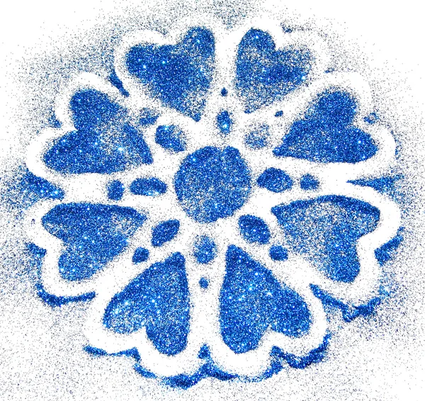 Fond flou avec flocon de neige de paillettes bleues scintille sur blanc — Photo