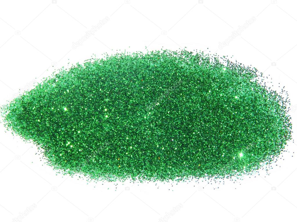 Green glitter sparkle on white background with place for your text