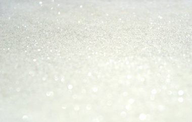 Arka plan beyaz glitter ile bir kar gibi parıldıyor tatil bulanık