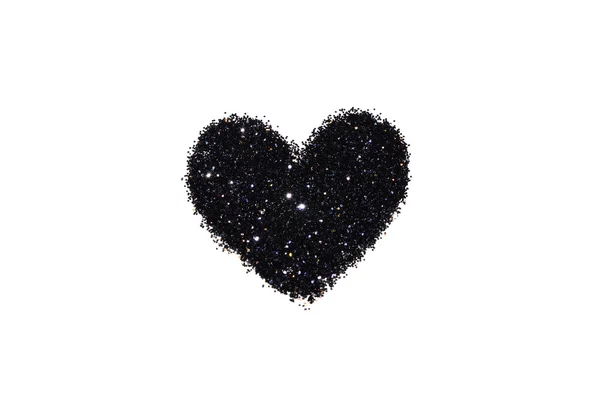 Abstracte hart van zwarte glitter schittering op witte achtergrond — Stockfoto