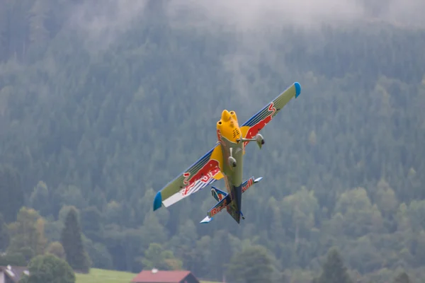 Model aircraft of RedBull in aerobatics — Stock Photo, Image