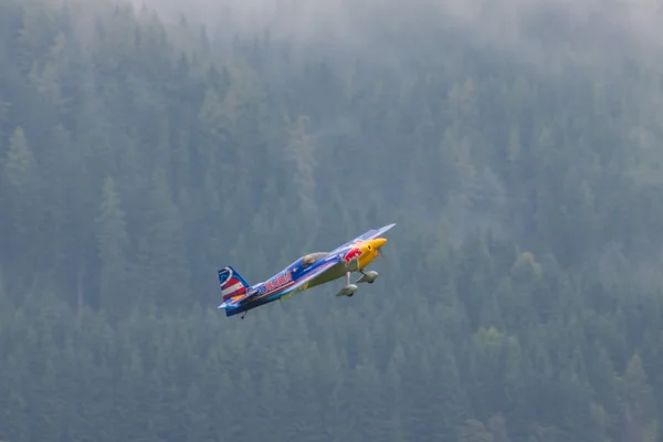 Model aircraft of RedBull in aerobatics — Stock Photo, Image