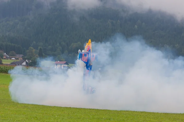 Model aircraft of RedBull in aerobatics — Stock Photo, Image