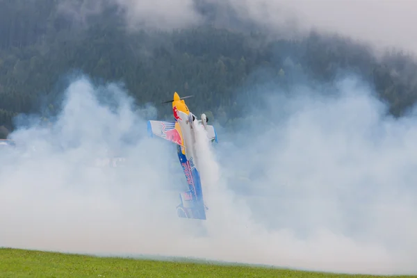 Model aircraft of RedBull in aerobatics — Stock Photo, Image