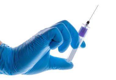 Hand with a blood sampling set