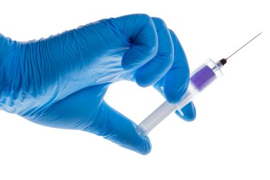 Hand with a blood sampling set