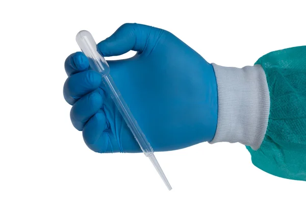 Hand with a Pasteur pipette — 图库照片