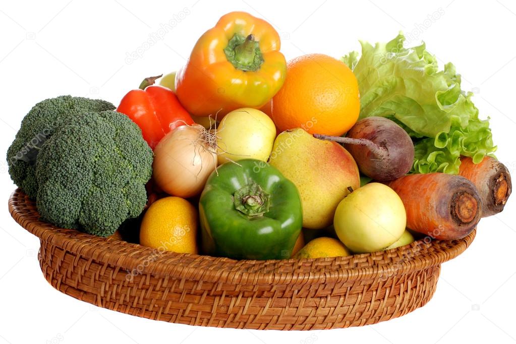 Basket of vegetables and fruits on isolated background