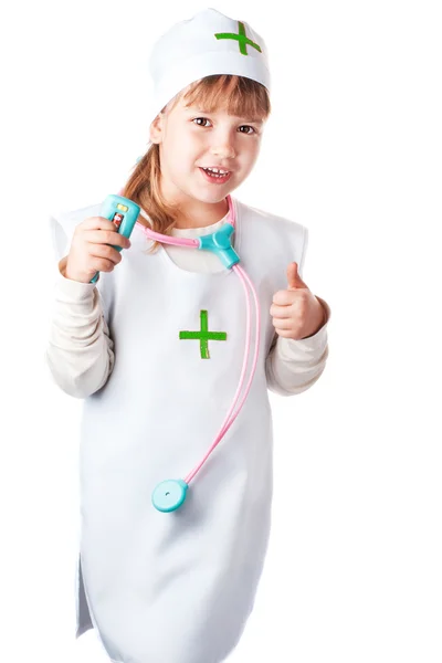 Маленькая девочка, одетая как врач на изолированном фоне — стоковое фото