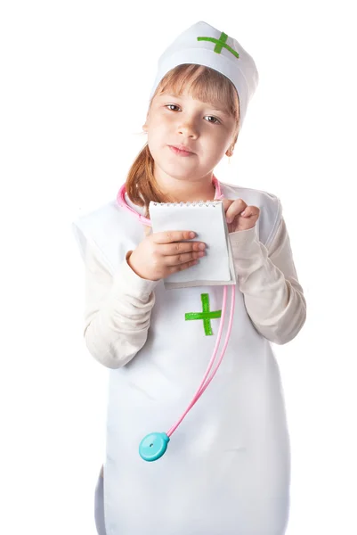 Маленькая девочка, одетая как врач на изолированном фоне — стоковое фото