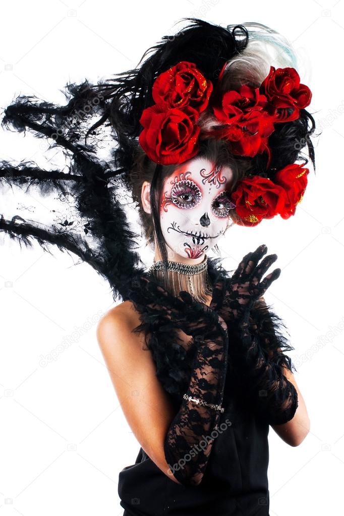 Girl with make-up in the style of Halloween. sugar skull styling. Isolated on white background.