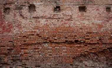 Eski, harap olmuş kırmızı tuğla duvar
