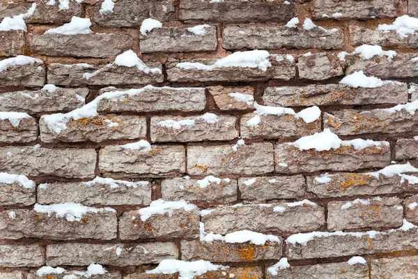 Taş arka plan ile kar