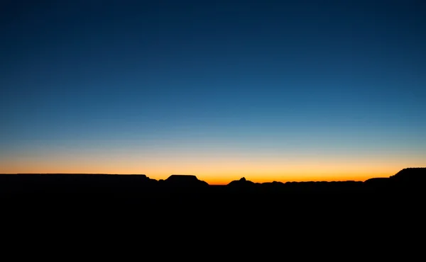 Grand canyon arizona de céu ao nascer do sol — Fotografia de Stock