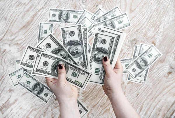 Dinero falso en las manos — Foto de Stock