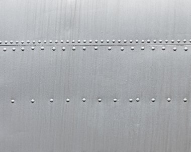 metal arka plan perçinler ile