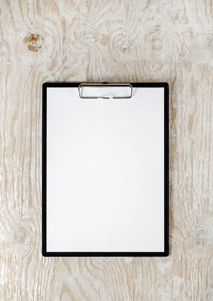 Clipboard with white paper