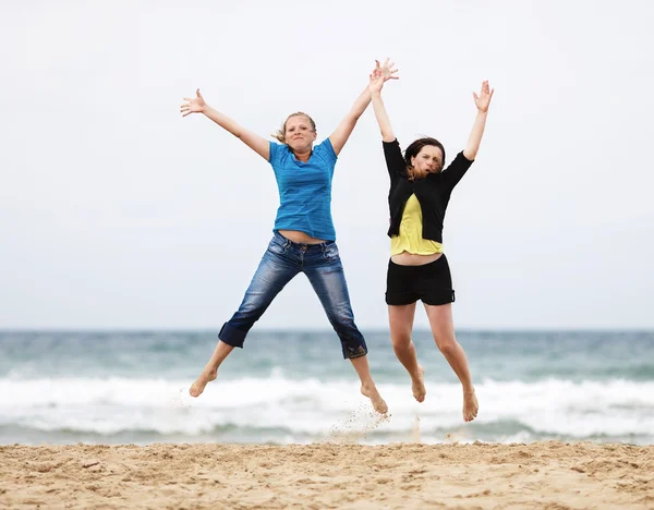Young women jump — Stock Photo, Image