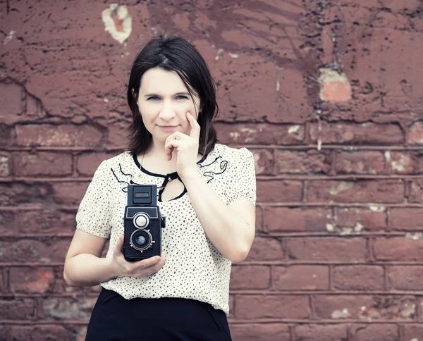 Woman with vintage camera — Stock Photo, Image