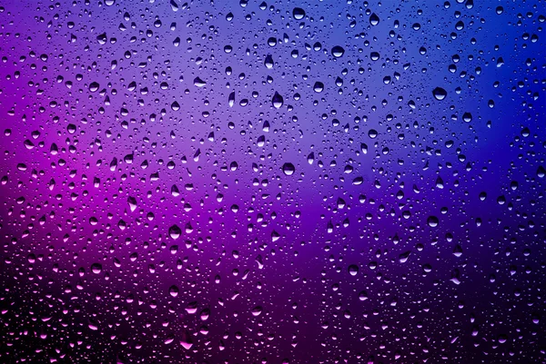 Raindrops on a window pane — Stock Photo, Image