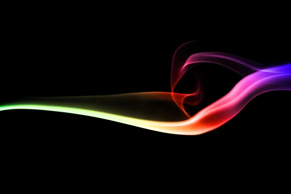 Colored smoke on dark — Stock Photo, Image