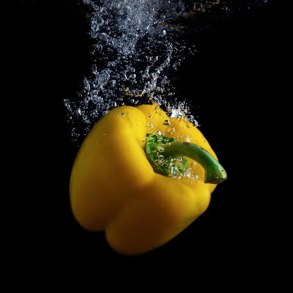 Pepper in water — Stock Photo, Image