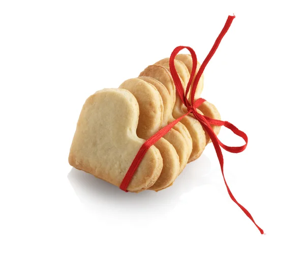 Cookies-hearts with red ribbon — Stock Photo, Image