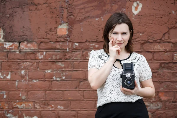 Woman with an old camera — Stock Photo, Image