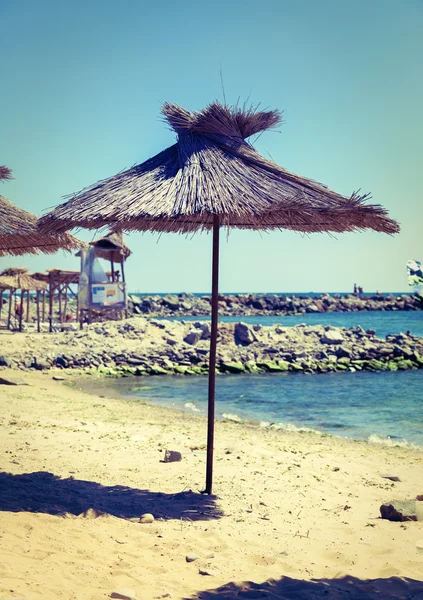 Beach straw umbrella — Stock Photo, Image