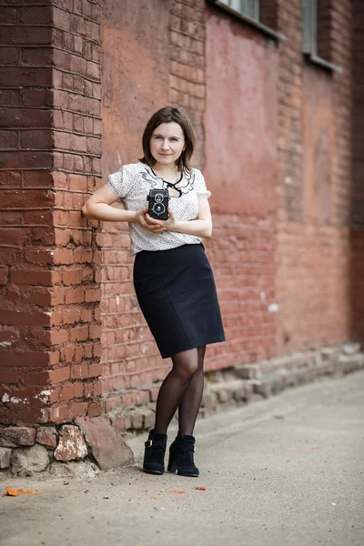 Girl with vintage camera — Stock Photo, Image