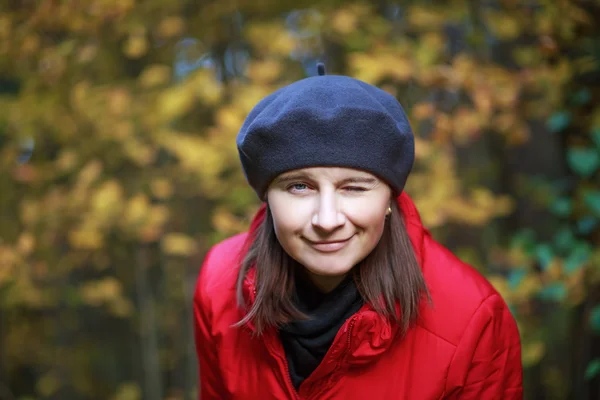 Woman winking — Stock Photo, Image