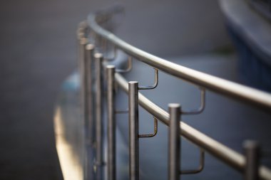 Chrome fence with handrail clipart
