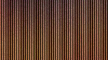 Fütürist cam soyut 4k video arkaplan modeli soyut kahverengi bakır eğimli dikey tırtıklı çizgiler ışık ve gölge dijital sanat arka planı ile gürültü dokusu