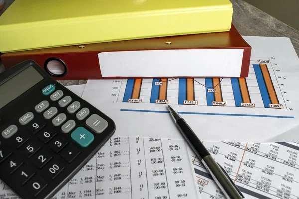 On financial documents with a chart, there are two folders with space for text . Business and financial concept