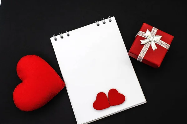 Black Background Red Heart Gift Box Notebook Blank Sheet Two — Stock Photo, Image