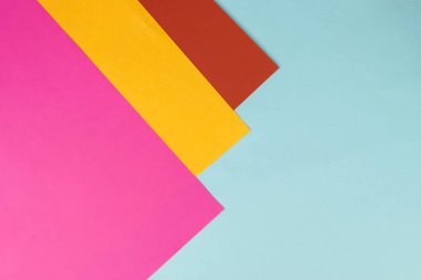 Çeşitli renklerde kağıt kağıtlardan oluşan bir arkaplan