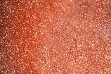 Beyaz benekli kırmızı betondan oluşan arkaplan