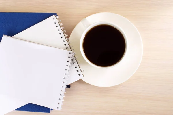 Wooden Table White Coffee Cup Sits Next Stack Notebooks Stock Photo