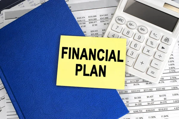 Inscription Financial Plan Yellow Sheet Lies White Calculator Blue Notebook — Stock Photo, Image