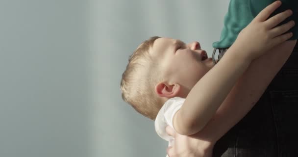 Crying Little Boy Parent Seeking Comfort Shot Indoors Red Camera — Stock Video