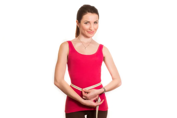 Güzel fitness kızın beline izole ölçme