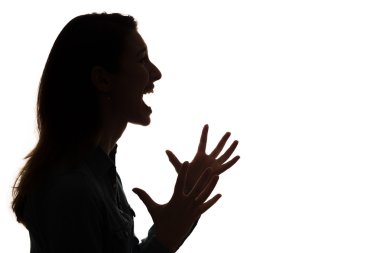 Profile of screaming woman in silhouette clipart