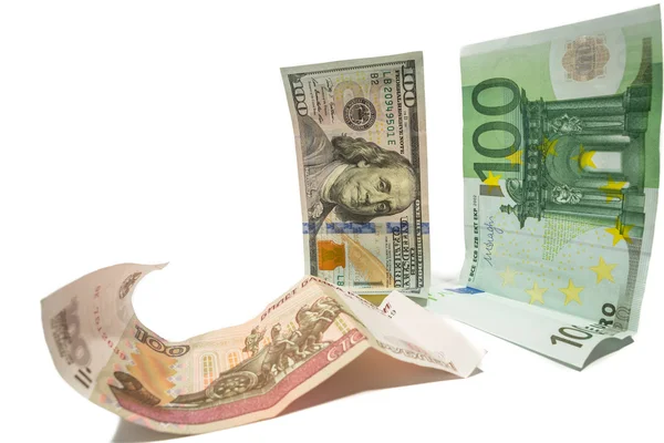 Currency dollar and euro looking at fallen russian ruble — Stock Photo, Image