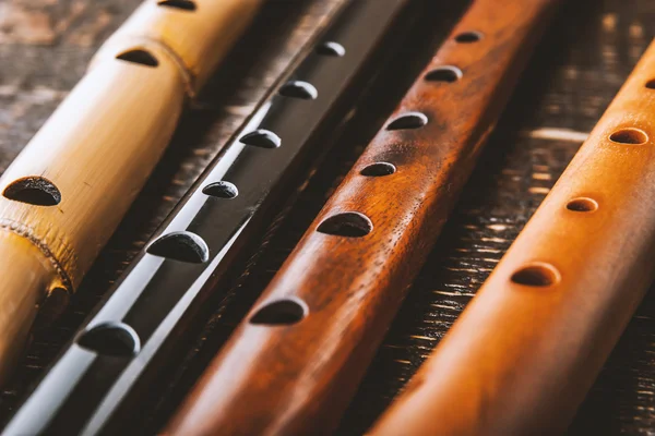 Set of flutes  on the wooden table horizontal — Stock Photo, Image