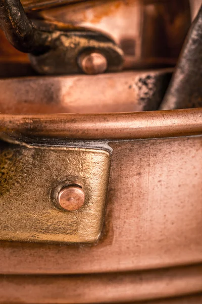 Copper pots and pans background vertical — Stock Photo, Image